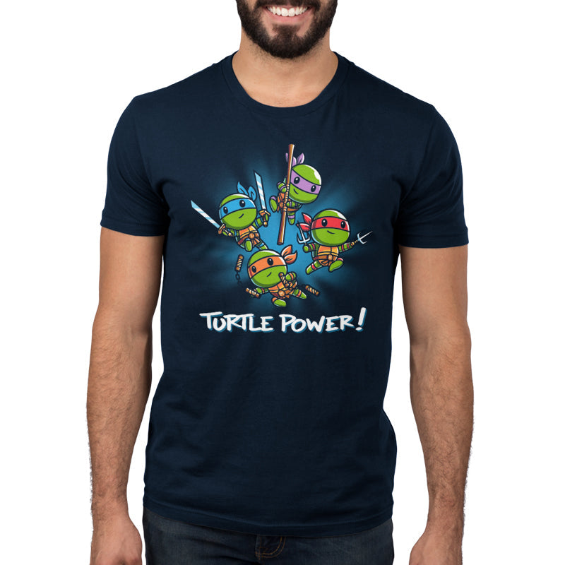 Premium Cotton T-shirt_TeeTurtle navy blue Turtle Power apparel featuring Raphael, Leonardo, Michaelangelo, and Donatello with weapons drawn in dynamic leaping poses.