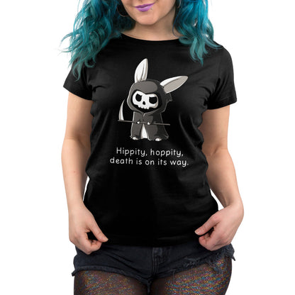 Premium Cotton T-shirt_Teeturtle Grim Bunny (Glow) Black Featuring a hooded, Grim Reaper-looking bunny with a skull face and a scythe with 'Hippity, hoppity, death is on its way.' written beneath.