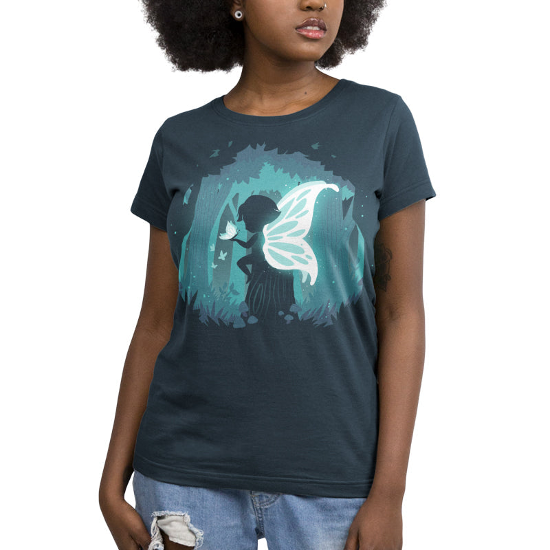 Premium Cotton T-shirt_Teeturtle Forest Fairy navy blue t-shirt Featuring a silhouetted fairy with luminous wings in a mystical forest holding a butterfly.