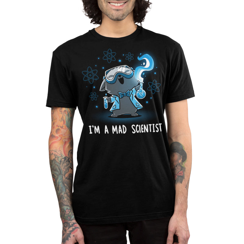 Premium Cotton T-shirt_TeeTurtle Mad Scientist black t-shirt featuring an illustration of a cartoon gray cat smiling evilly wearing safety goggles, a lab coat and a bowtie holding chemistry apparatus surrounded by floating orbs. "I'M A MAD SCIENTIST" is written underneath.  