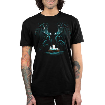 Premium Cotton T-shirt_TeeTurtle Epic Cthulhu black t-shirt featuring the fictional cosmic creature Cthulhu hovering over a brown ship with whites sails in the  in the stormy, dark sea.