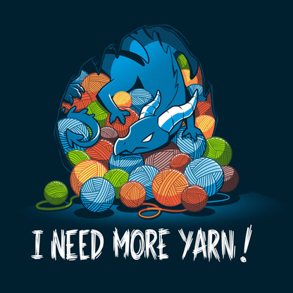 Premium Cotton T-shirt_TeeTurtle Yarn Hoarder navy blue t-shirt featuring a blue dragon sitting on top of a pile of multi-colored yarn balls. The words "I NEED MORE YARN!" are written underneath the illustration.