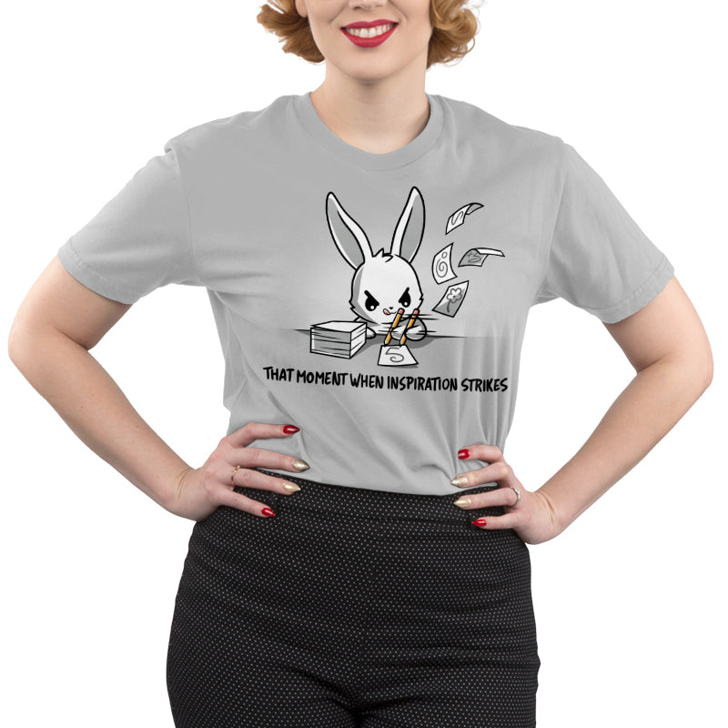 Premium Cotton T-shirt_TeeTurtle When Inspiration Strikes silver gray t-shirt featuring a white bunny rapidly writing on a stack of paper and making the paper fly away from writing so fast. "THAT MOMENT WHEN INSPIRATION STRIKES" is written below.