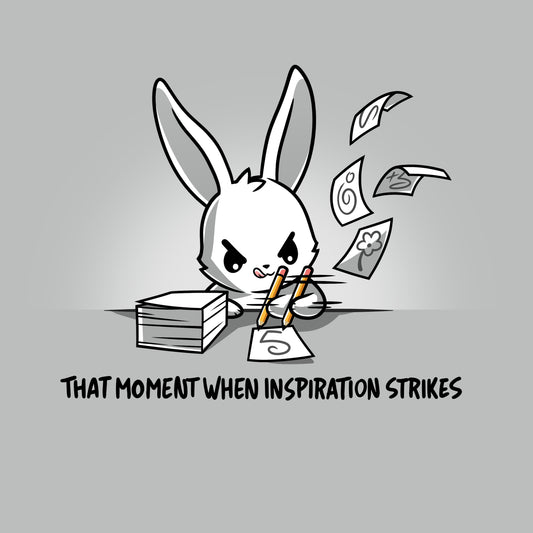 Premium Cotton T-shirt_TeeTurtle When Inspiration Strikes silver gray t-shirt featuring a white bunny rapidly writing on a stack of paper and making the paper fly away from writing so fast. 