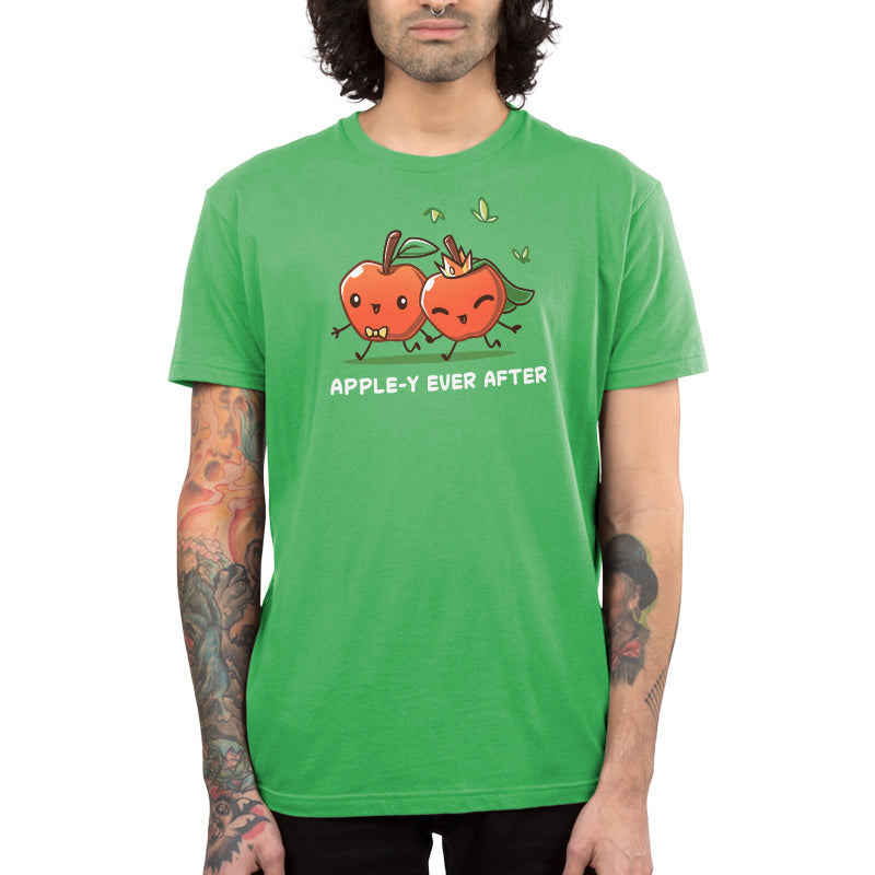 Premium Cotton T-shirt_TeeTurtle Apple-y Ever After apple green t-shirt featuring two animated apples with happy faces holding hands, one wearing a bow tie and the other a crown and veil. The text "APPLE-Y EVER AFTER" is displayed below. 