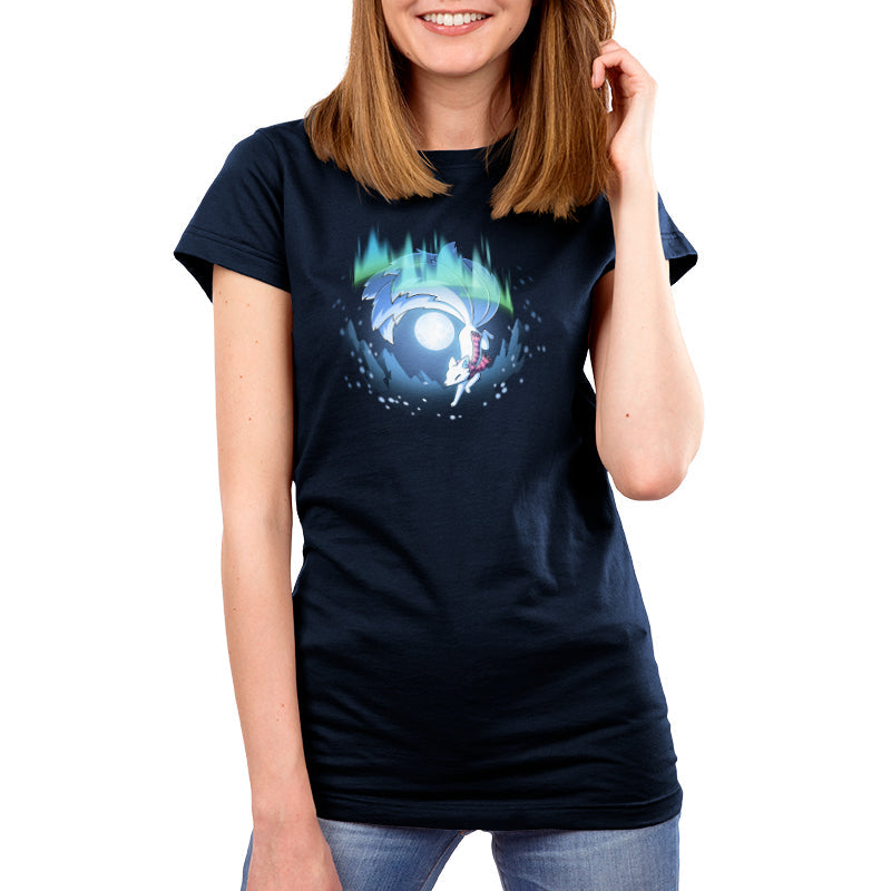 Premium Cotton T-shirt_TeeTurtle navy blue Aurora Kitsune apparel featuring a white kitsune running through the aurora borealis with snowy mountains and a full moon in the background.