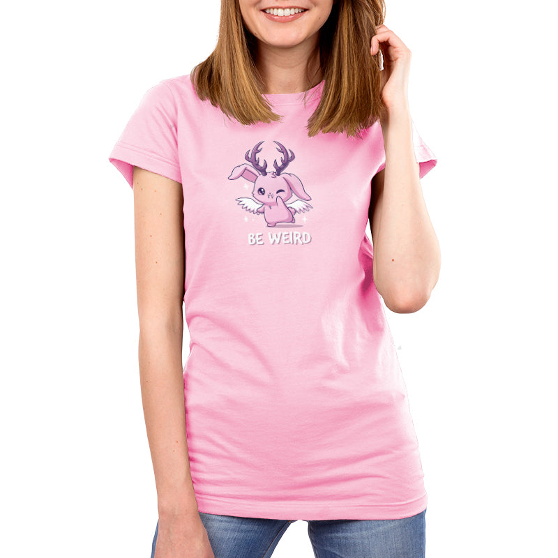 Premium Cotton T-shirt_TeeTurtle light pink Be Weird t-shirt featuring a winking wolpertinger.