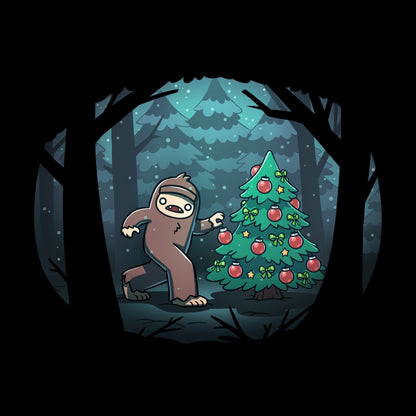 Premium Cotton T-shirt_TeeTurtle black Bigfoot Christmas apparel featuring a sasquatch caught putting holiday decor on a tree in the middle of a snowy forest.