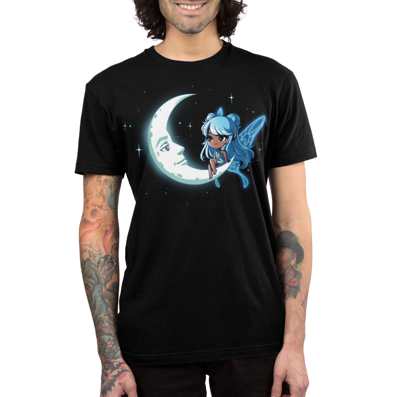 Premium Cotton T-shirt_TeeTurtle Celestial Fairy black t-shirt featuring a space fairy with blue hair and wings sitting on a crescent moon that has a face with stars in the background.