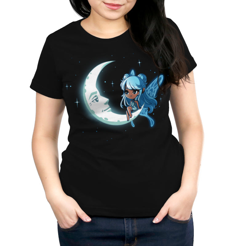 Premium Cotton T-shirt_TeeTurtle Celestial Fairy black t-shirt featuring a space fairy with blue hair and wings sitting on a crescent moon that has a face with stars in the background.