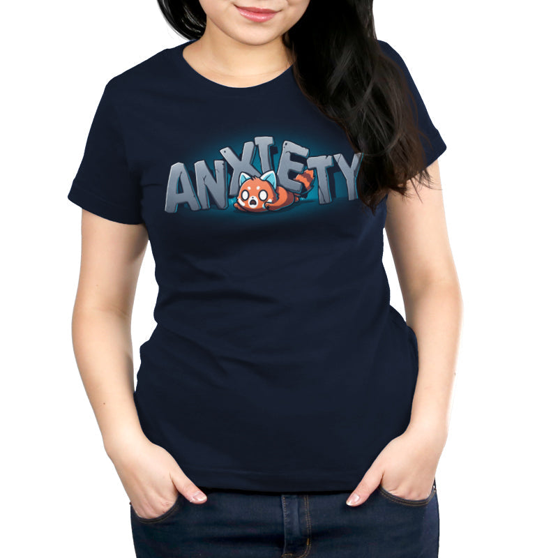 Premium Cotton T-shirt_TeeTurtle Crushing Anxiety navy blue t-shirt featuring an anxious red panda being squished under giant letters made of stone that spell "Anxiety" on top of his body. 