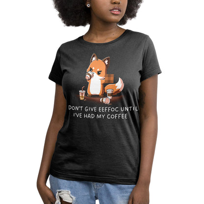 Premium Cotton T-shirt_TeeTurtle Don’t Give Eeffoc black t-shirt featuring an unapologetic fox drinking a coffee, surrounded by empty coffee cups.