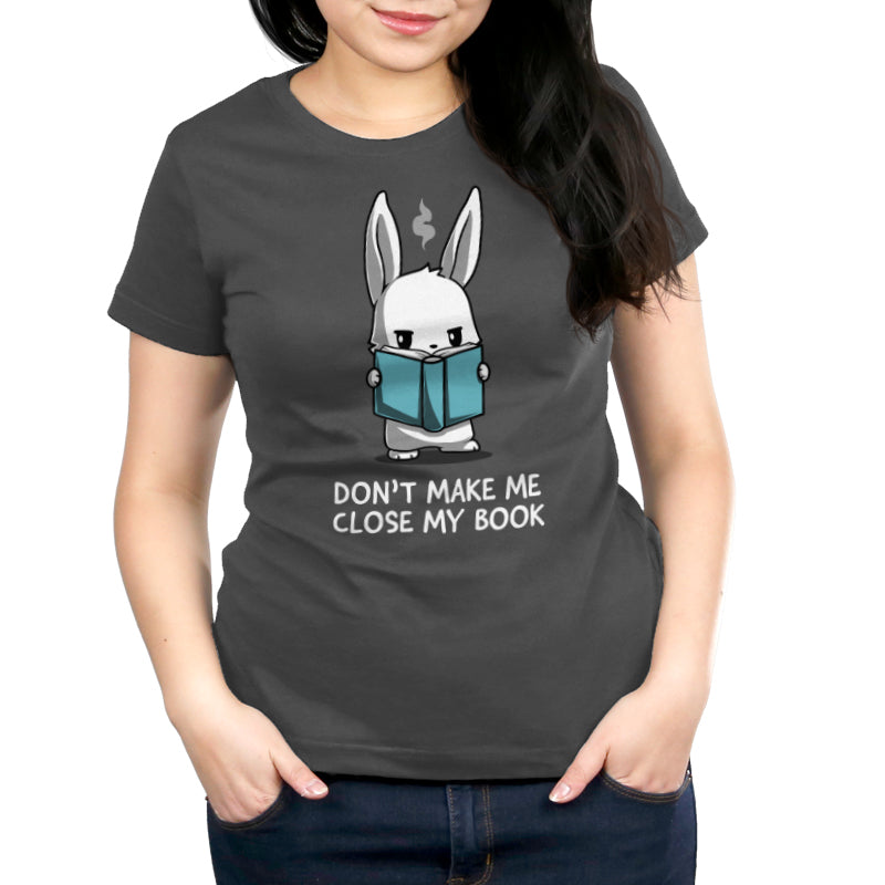 Premium Cotton T-shirt_TeeTurtle Don't Make Me Close My Book charcoal gray t-shirt featuring a rabbit holding a blue book and looking stern.