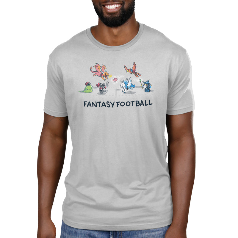 Premium Cotton T-shirt_TeeTurtle Fantasy Football Silver Gray t-shirt featuring an illustration of fantasy creatures, including a dragon, knight, unicorn, bird, and wizard, playing football with the text "Fantasy Football" below them. 