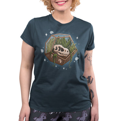 Premium Cotton T-shirt_TeeTurtle Flora Fossils denim t-shirt featuring an illustration of a skull in a hexagonal glass terrarium with various plants growing inside, surrounded by small stars and swirls.