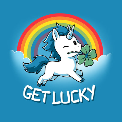 Premium Cotton T-shirt_Teeturtle Get Lucky cobalt blue t-shirt featuring a winking white unicorn holding a four-leaf clover while jumping through the clouds with a rainbow behind.
