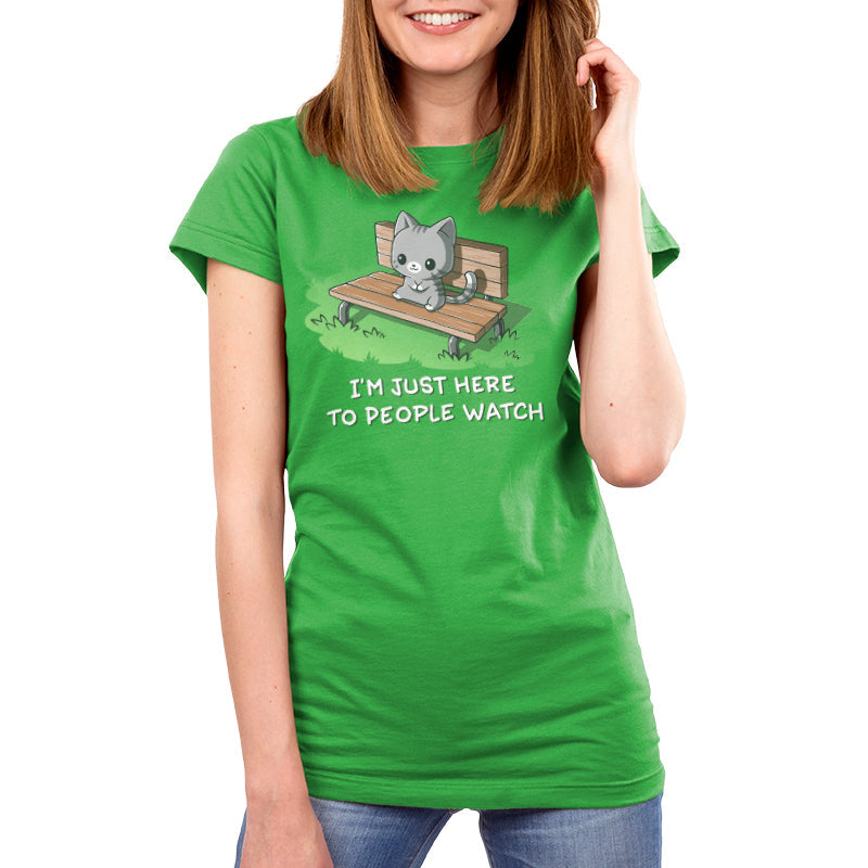 Premium Cotton T-shirt_TeeTurtle I'm Just Here to People Watch apple green t-shirt featuring an illustration of a cute gray cartoon cat sitting on a bench in the grass, accompanied by the text "I'M JUST HERE TO PEOPLE WATCH" written below. 