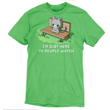 Premium Cotton T-shirt_TeeTurtle I'm Just Here to People Watch apple green t-shirt featuring an illustration of a cute gray cartoon cat sitting on a bench in the grass, accompanied by the text "I'M JUST HERE TO PEOPLE WATCH" written below. 