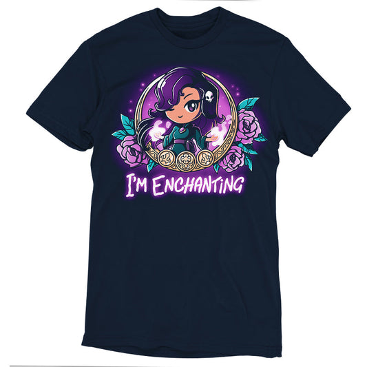 Premium Cotton T-shirt_TeeTurtle I'm Enchanting navy blue t-shirt featuring an illustration of a girl positioned within a gold-edged, ornate frame decorated with purple flowers and leaves winking her purple eyes with a white skull in her purple hair. 