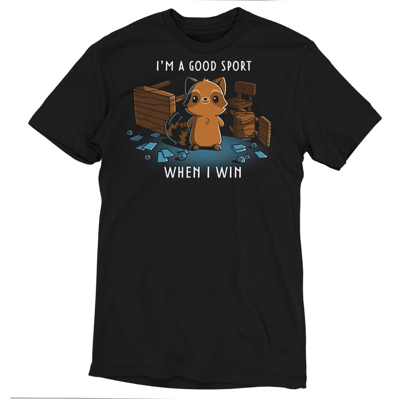 Premium Cotton T-shirt_Teeturtle I'm a Good Sport Black Featuring a smiling raccoon standing in the middle of flipped tables and chairs and surrounded by cards and gaming dice with 'I'm a Good Sport, When I Win.' written above and below.