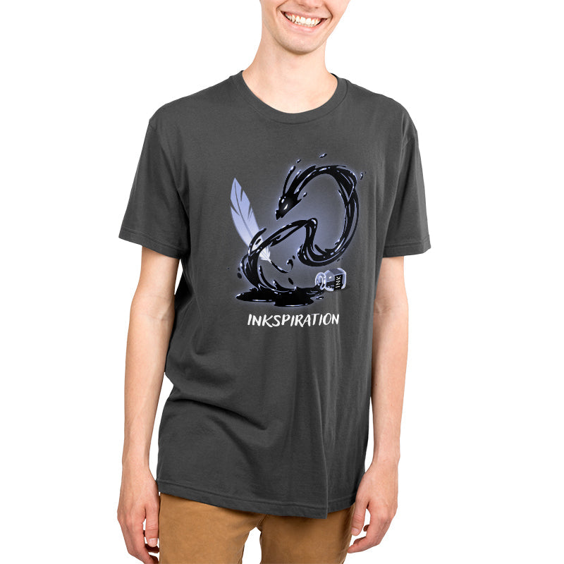 Premium Cotton T-shirt_TeeTurtle Inkspiration charcoal gray t-shirt featuring a feather quill that appears to transform into a black dragon-like swirl above an ink bottle, with the word "INKSPIRATION" below.