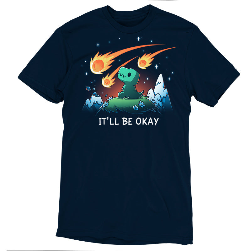 Premium Cotton T-shirt_TeeTurtle It'll Be Okay navy blue t-shirt featuring a green dinosaur who sits on a grassy hill with comet-like objects falling from the sky around them with the words "IT'LL BE OKAY" below them. 