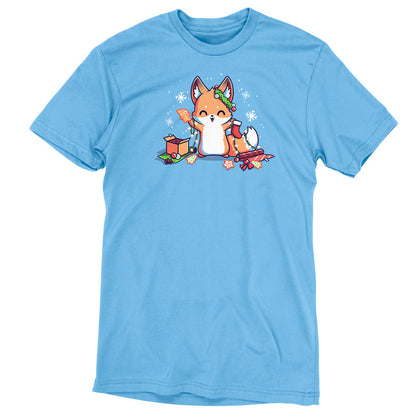 Premium Cotton T-shirt_TeeTurtle It's That Time of Year light blue t-shirt featuring a cheerful fox with green garland around its left ear surrounded by snowflakes and holding a red holiday stocking in one hand a Christmas cookie and a string of lights in the other. On the floor is red gift wrap, a red bow, Christmas cookies and a brown box on top of green gift wrap. 