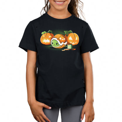 Premium Cotton T-shirt_Teeturtle Jack-o-Lantern Turtle black t-shirt featuring a small turtle is nestled inside an orange shell. It's surrounded by three carved pumpkins with glowing faces and a paint can with a brush.