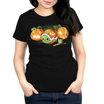 Premium Cotton T-shirt_Teeturtle Jack-o-Lantern Turtle black t-shirt featuring a small turtle is nestled inside an orange shell. It's surrounded by three carved pumpkins with glowing faces and a paint can with a brush.