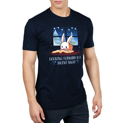 Premium Cotton T-shirt_TeeTurtle navy blue Looking Forward to a Silent Night. Featuring a reading bunny with a snowy forest outside.