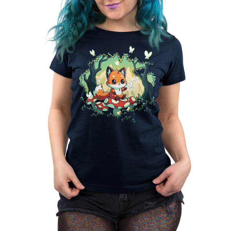 Premium Cotton T-shirt_TeeTurtle navy blue Magical Forest. Featuring a fox sitting on a toadstool in a forest with butterflies.