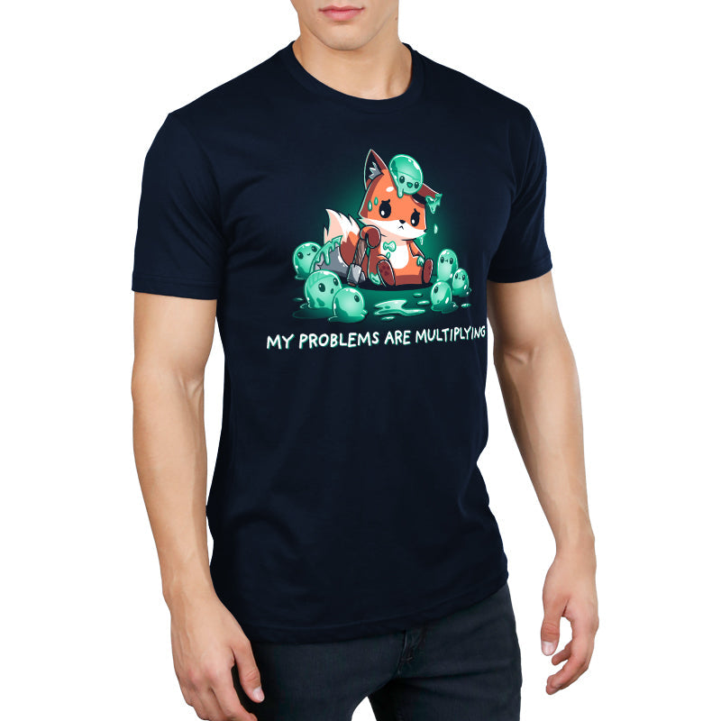 Premium Cotton T-shirt_TeeTurtle My Problems are Multiplying navy blue t-shirt featuring a sad fox holding an axe and surrounded by fantasy green slimes that are multiplying.