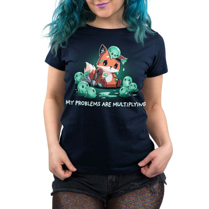 Premium Cotton T-shirt_TeeTurtle My Problems are Multiplying navy blue t-shirt featuring a sad fox holding an axe and surrounded by fantasy green slimes that are multiplying.