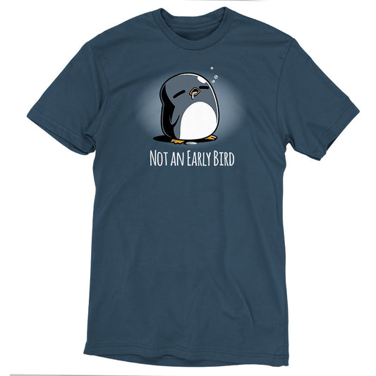 Premium Cotton T-shirt_TeeTurtle Not an Early Bird denim blue t-shirt featuring a sleepy penguin with closed eyes and bubbles above its head, accompanied by the text 