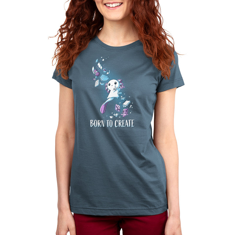 Premium Cotton T-shirt - A person with long red hair is wearing a denim blue apparel from monsterdigital, made of super soft ringspun cotton, featuring a "Born to Create" graphic with a whimsical design on it.