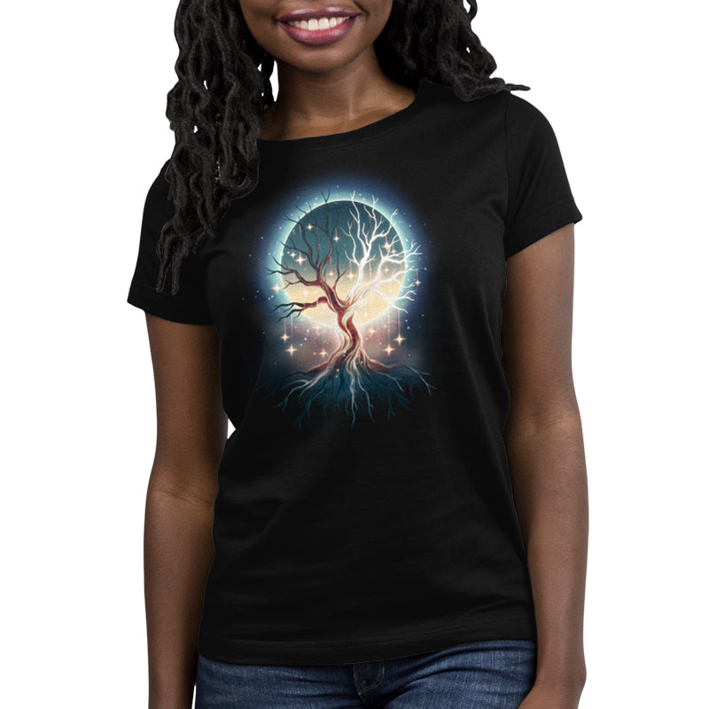 Premium Cotton T-shirt_TeeTurtle black Celestial Tree t-shirt featuring a floating tree with roots exposed with stars hanging from its branches and a full moon that can be seen in the background through the tree’s branches.