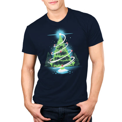 Premium Cotton T-shirt_TeeTurtle Christmas Tree navy blue t-shirt featuring a green tree in the forest with red ornaments with a white swirl around the tree and a winkling start right above it