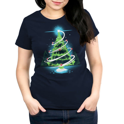 Premium Cotton T-shirt_TeeTurtle Christmas Tree navy blue t-shirt featuring a green tree in the forest with red ornaments with a white swirl around the tree and a winkling start right above it