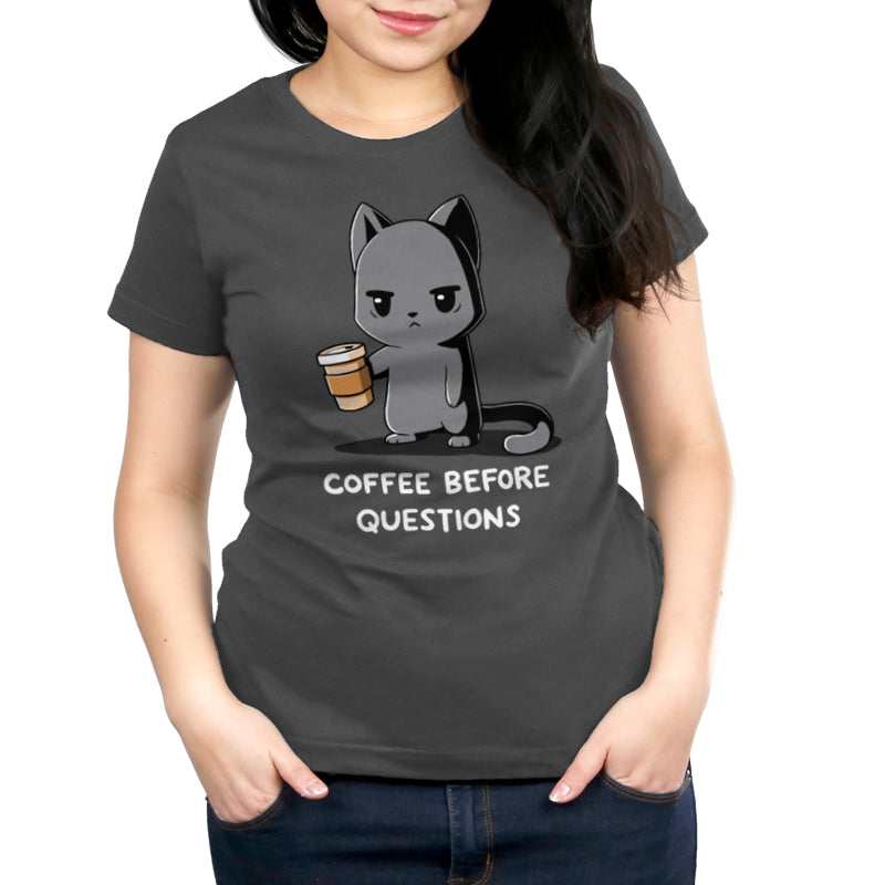 Premium Cotton T-shirt_TeeTurtle charcoal gray Coffee Before Questions. Featuring a grumpy cat holding a coffee cup saying, "Coffee Before Questions".