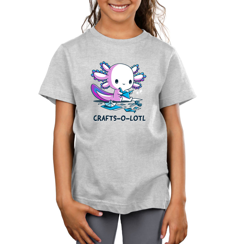 Premium Cotton T-shirt_TeeTurtle Crafts-O-Lotl Silver Gray t-shirt featuring a cute axolotl making origami crafts, surrounded by paper and completed pieces. Text below reads "CRAFTS-O-LOTL"