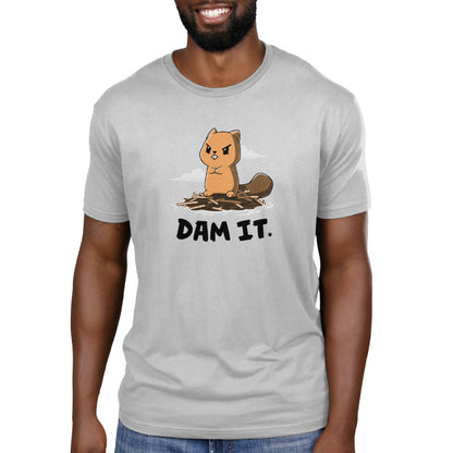 Premium Cotton T-shirt_TeeTurtle Dam It Silver Gray t-shirt featuring A cartoon beaver with an angry expression stands on a dam of sticks with the text "DAM IT." below. 