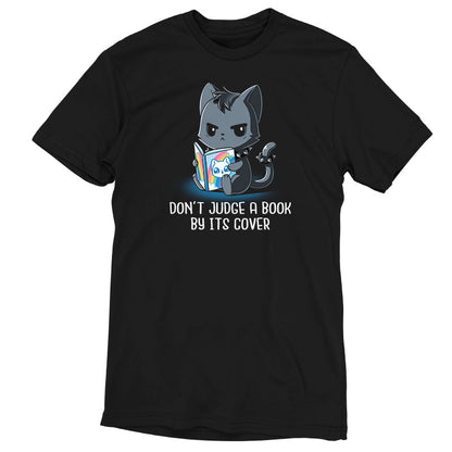 Premium Cotton T-shirt_TeeTurtle Don't Judge a Book By It's Cover black t-shirt featuring seemingly grumpy, goth-looking cat wearing a spiked collar and spiked ring on its tail reading a bright, happy-looking rainbow-covered book above the text 'Don't Judge A Book By Its Cover.'