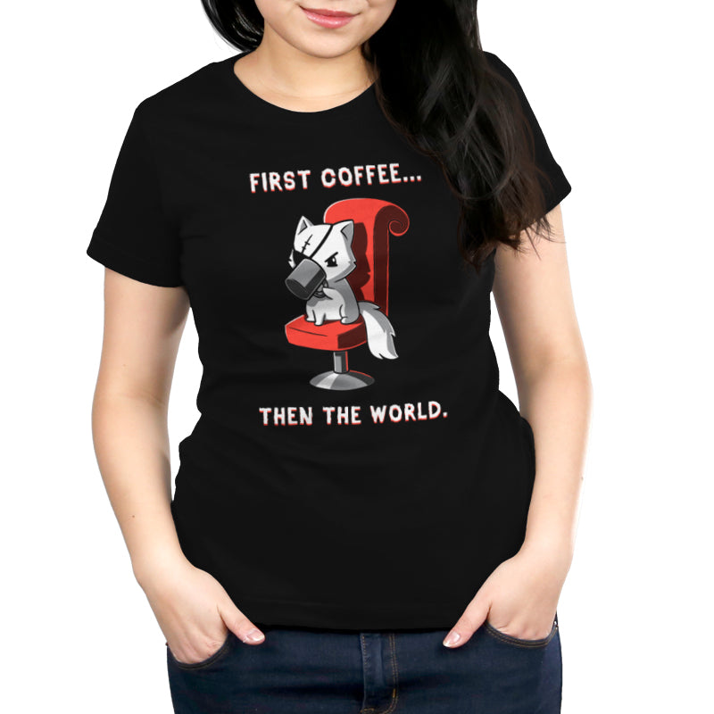 Premium Cotton T-shirt_TeeTurtle black First Coffee... Then the World. Featuring a white cat with an eyepatch drinking coffee on a red chair, saying, "First Coffee... Then the World".