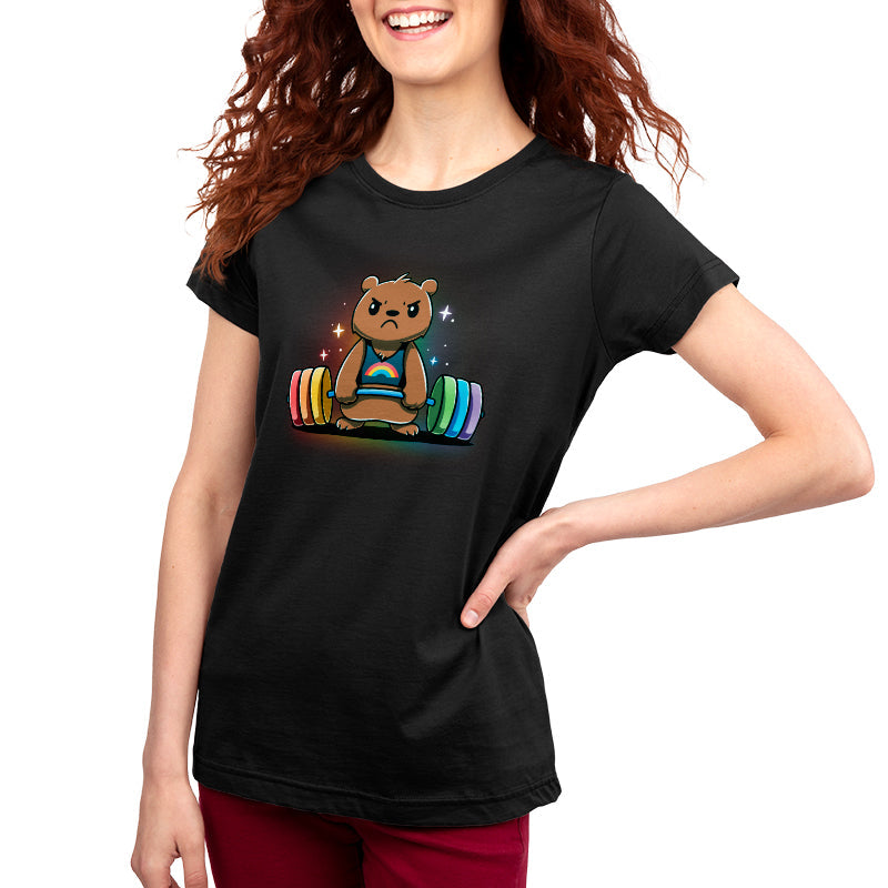 Premium Cotton T-shirt_TeeTurtle Gym Bear black t-shirt featuring a bear in a rainbow tank top lifting a colorful barbell against a dark background with star-like sparkles.