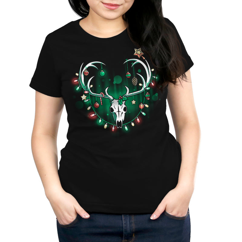 Premium Cotton T-shirt_TeeTurtle Haunting Holidays black t-shirt featuring an illustration of a white skull deer with its antlers decorated with red, yellow and green Christmas lights and ornaments such as small spheres, stars, pinecones, and candy canes.