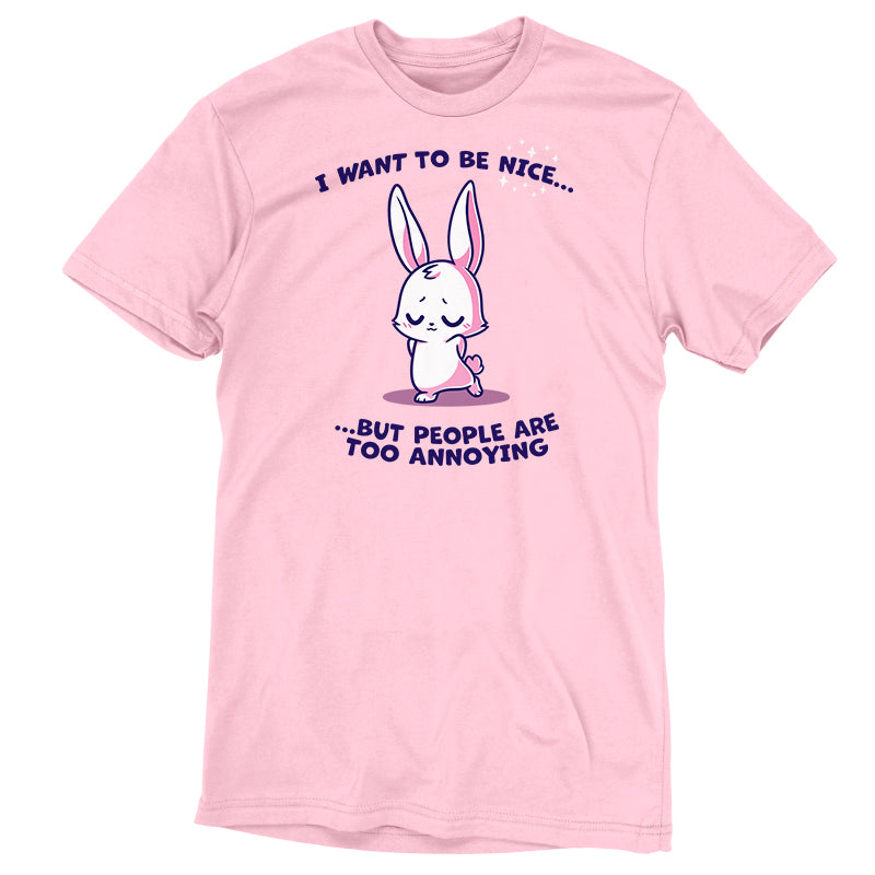 Premium Cotton T-shirt_Teeturtle I Want to Be Nice... light pink t-shirt featuring a cute bunny with closed eyes and folded ears standing with a shy expression. The text above and below says, "I want to be nice... but people are too annoying." 