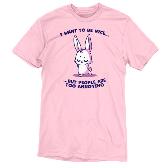 Premium Cotton T-shirt_Teeturtle I Want to Be Nice... light pink t-shirt featuring a cute bunny with closed eyes and folded ears standing with a shy expression. The text above and below says, 