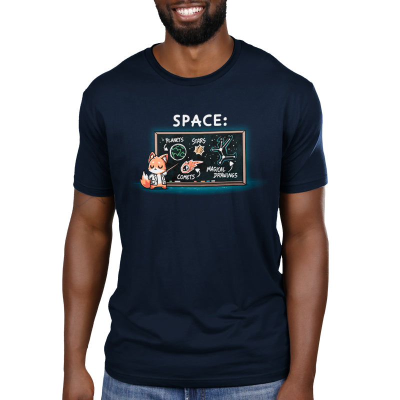 Premium Cotton T-shirt - Man wearing a super soft ringspun cotton navy blue apparel with an illustration of a fox pointing to a chalkboard labeled “Space” featuring space drawings of planets, stars, comets, and the text "Interstellar Knowledge" by monsterdigital.