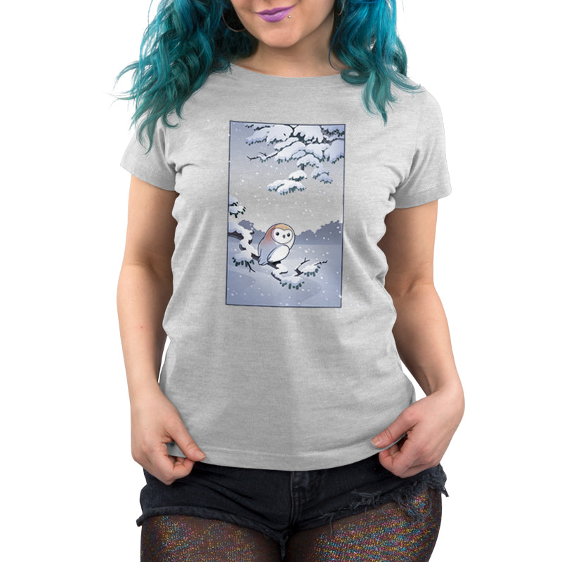 Premium Cotton T-shirt_TeeTurtle silver gray Snowy Owl apparel featuring a barn owl perched on a snowy branch with snow falling in the background.