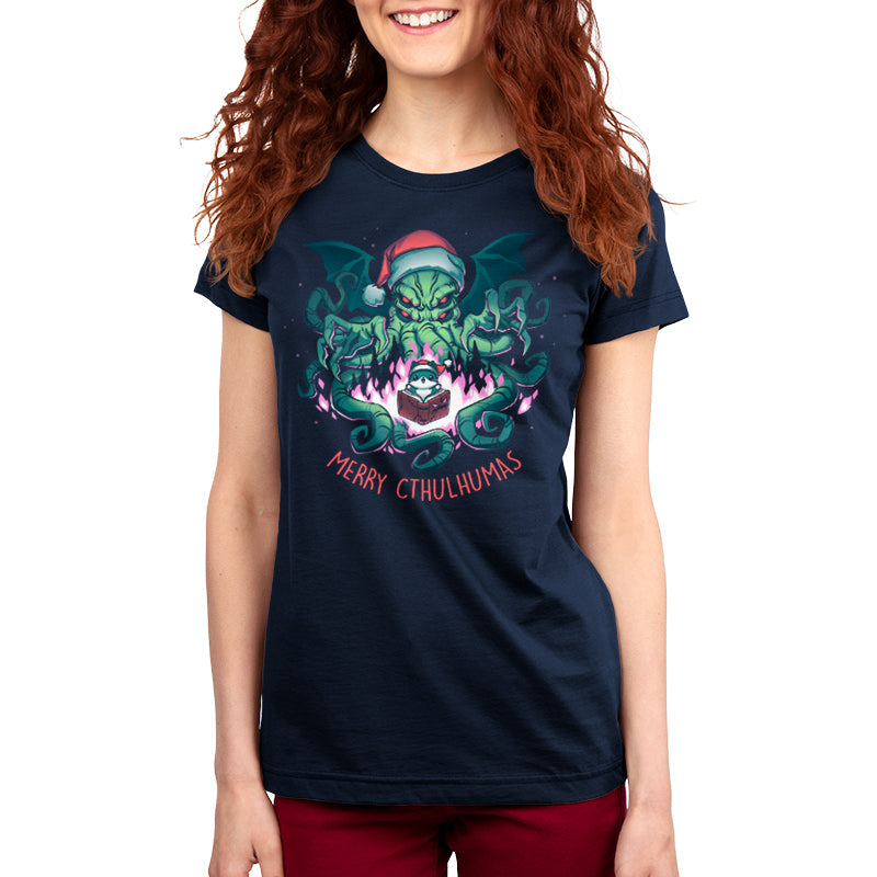 Premium Cotton T-shirt - featuring a big scary cthulhu showing its claws right above a cute little cat in a santa hat with a book open in front of it surrounded by purple fire